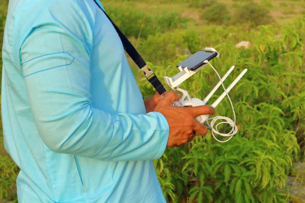 A drone operator photographing and controlling the drone during flight near Kalar Kahar, Punjab, Pakistan.
Location: Kalar Kahar, Punjab, Pakistan.
Date Taken: August 31, 2018.